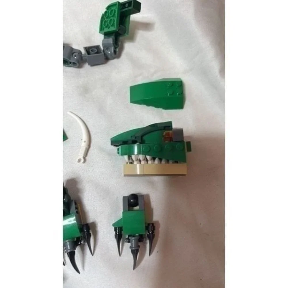 Lego Creator 3 in 1 Mighty Dinosaur Pieces.